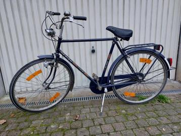 Vintage herenfiets beschikbaar voor biedingen