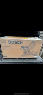Bosch afkortzaag, Ophalen