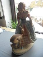 Ancienne statue en pierre d'une femme avec un cerf, Enlèvement