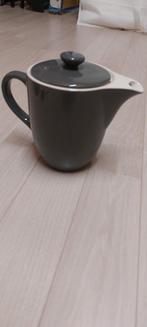 Theepot grijs/wit, Ophalen