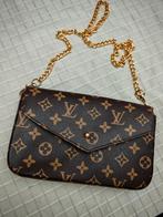 Tof handtasje, Enlèvement, Sac à main