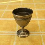 Antiek eierdopje, Ophalen