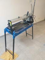 Waterzaag tegels, Ophalen