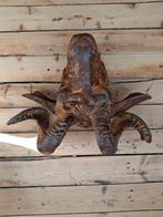 Metalen kop van een ram, Ophalen