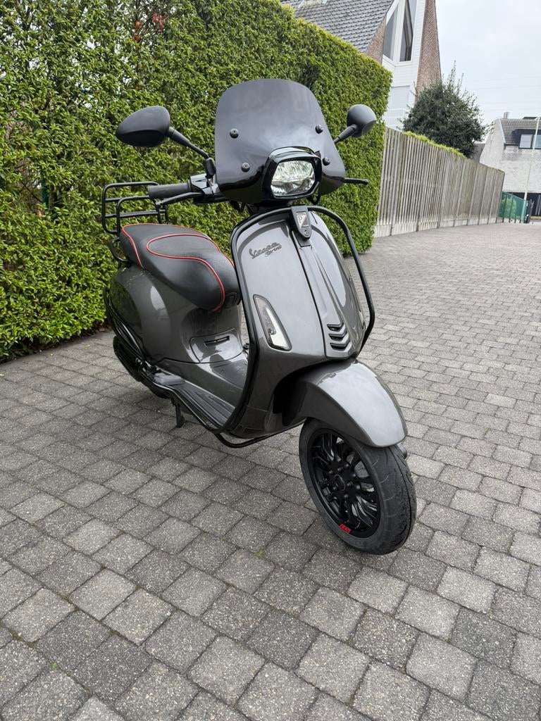 Vespa sprint A klasse agaat grijs, Ophalen