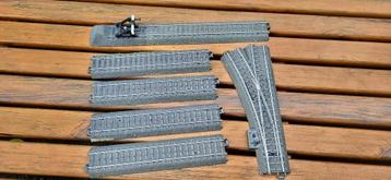 marklin C rails in goede gebruikte staat met scenery resten  beschikbaar voor biedingen