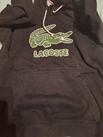 pull lacoste taille 3 disponible aux enchères