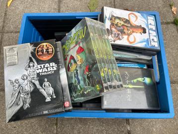 Caisse de DVD officiels - Lot mixte de vieux et neufs. beschikbaar voor biedingen