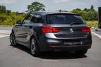 BMW 120 iA SPORT M-PAKKET | OPEN DAK | XENON | BMW SERVICE, Automaat, Zwart, Bedrijf, 5 zetels
