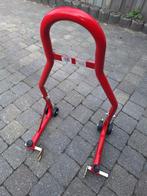 Motorsteun/statief achterwiel, Ophalen