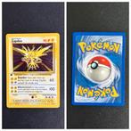 1st edition Zapdos Base - Near Mint!!, Hobby en Vrije tijd, Ophalen of Verzenden, Meerdere kaarten