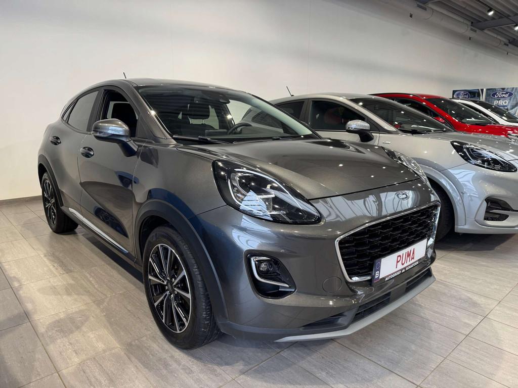 Ford Puma Titanium Style (bj 2022), Stof, Bedrijf, https://public.car-pass.be/vhr/c16f8db1-0c44-45b2-842f-a2e71131a151, 133 g/km