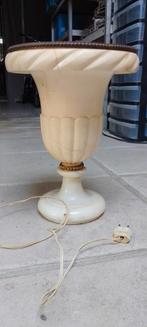 Marmeren lamp, Ophalen