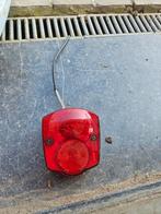 Suzuki achterlicht, Ophalen