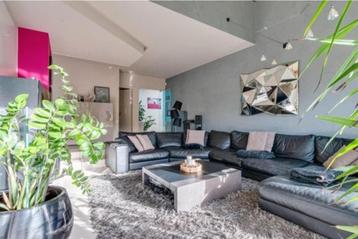 Grand canapé d'angle en cuir noir Natuzzi  beschikbaar voor biedingen