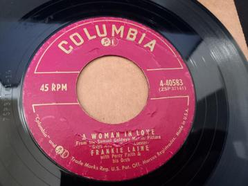 Frankie Laine ‎– A Woman In Love / Walking The Night Away '7 beschikbaar voor biedingen