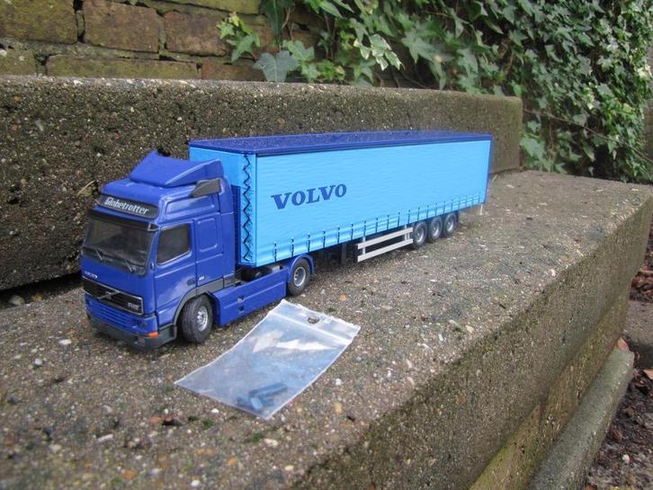 Tekno Volvo FH12 Globetrotter promotieuitgave., Hobby en Vrije tijd, Modelauto's | 1:50, Zo goed als nieuw, Bus of Vrachtwagen