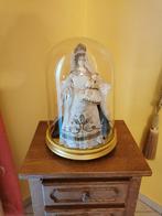 Globe en verre avec figurine religieuse, Enlèvement