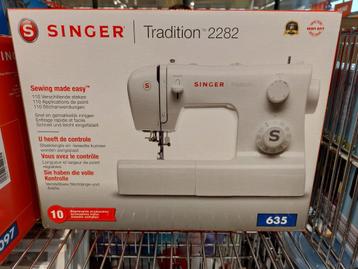 Machine à coudre Singer Tradittion 2280, très  peu utilisé .