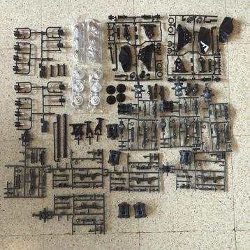 Lot Tamiya TT-02 onderdelen NIEUW (assen, fusees, draagarmen beschikbaar voor biedingen