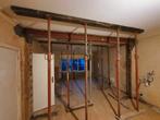 Draag muur afbreken en poutrel zeten.0466445657