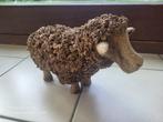 gesculpteerd schaap, Ophalen