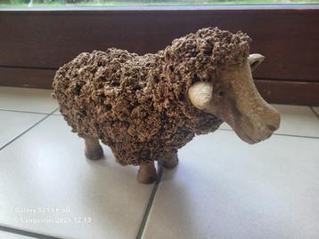 gesculpteerd schaap, Enlèvement