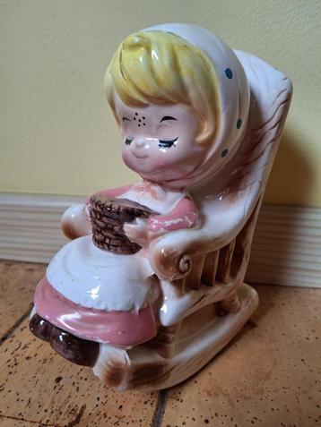 Spaarpot “Meisje in schommelstoel” beschikbaar voor biedingen