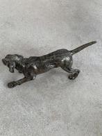 Beeldje van een jachthond, Ophalen