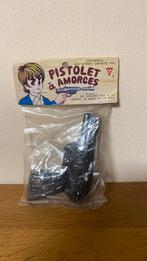 Ancien ancien petit pistolet dans son emballage neuf, Emballage