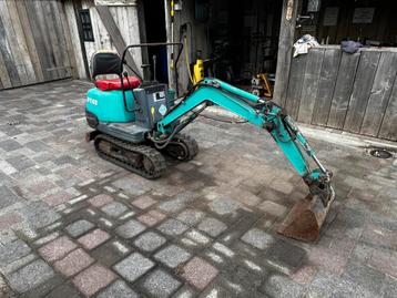 Komatsu mini kraan beschikbaar voor biedingen