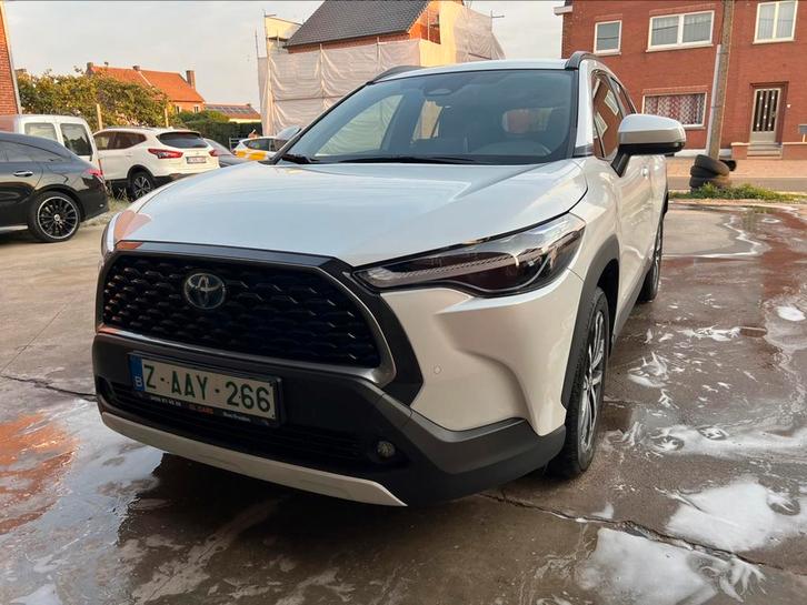 TOYOTA COROLLA CROSS 1.8 HYBRID AUTOMAAT EXPORT, Auto's, Toyota, Bedrijf, Te koop, Corolla Cross, Zetelverwarming, Hybride Elektrisch/Benzine
