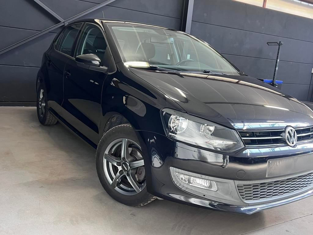 Vw Polo 1.2 benzine, bj2012, 133.000km, 1j garantie, Euro 5, Stof, Zwart, Zwart