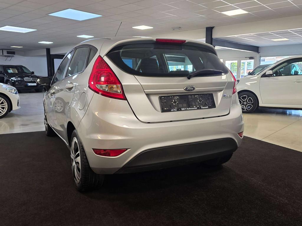 Ford Fiesta 1.25i Ghia - Benzine - Airco (bj 2011), Voorwielaandrijving, Euro 5, Stof, 4 cilinders
