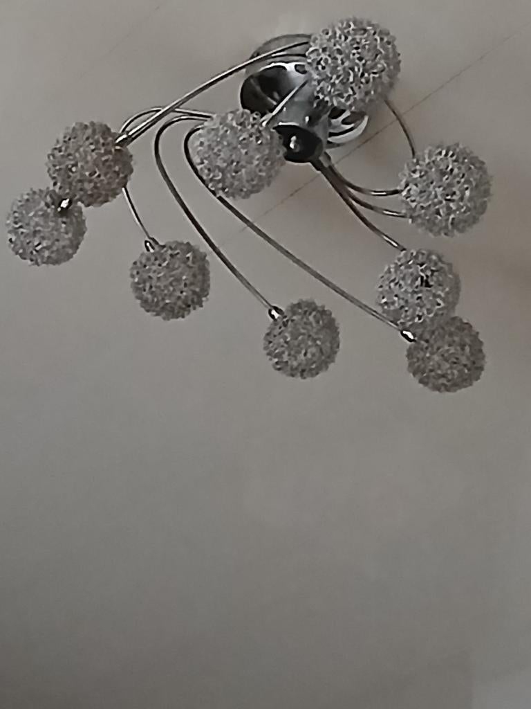 Lustre en inox moderne, Ophalen