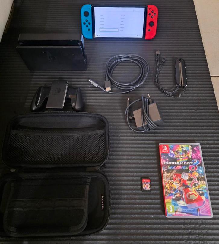NINTENDO SWITCH OLED MARIO KART IN UITSTEKENDE VERZORGDE STA, Games en Spelcomputers, Spelcomputers | Nintendo Switch, Switch OLED