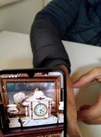 Schouwgarnituur werkt, Ophalen