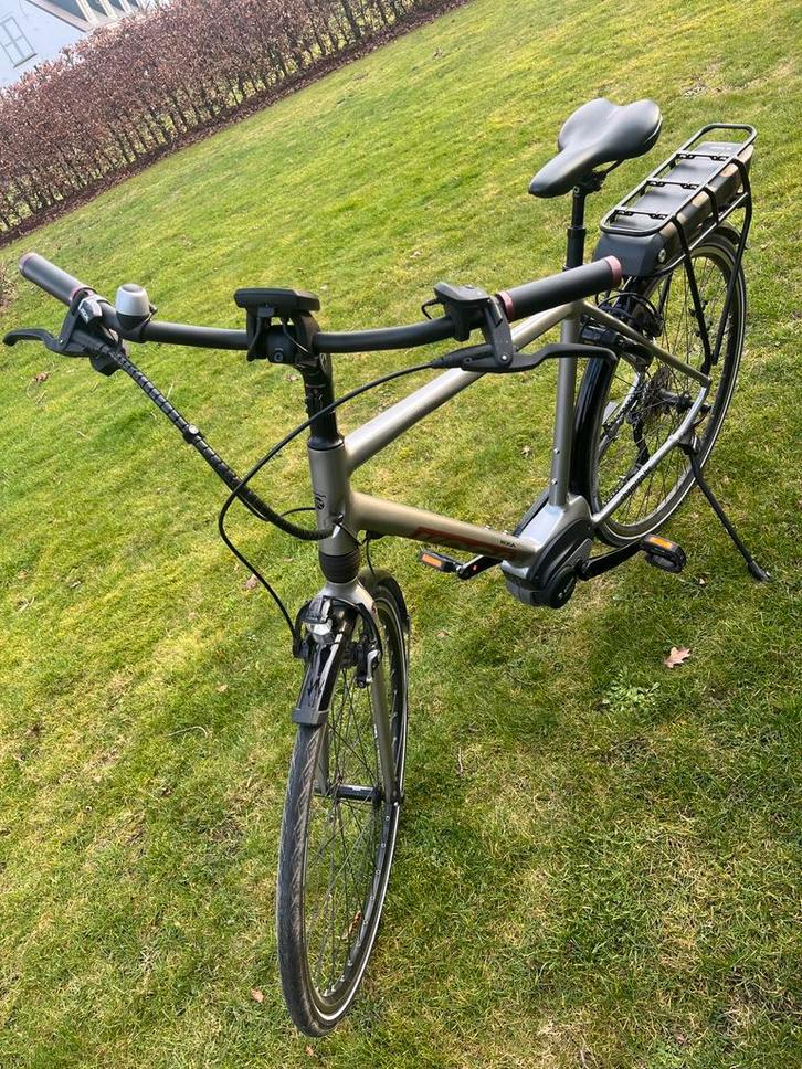 Koga elektrische herenfiets 25 km/h, Fietsen en Brommers, Elektrische fietsen, Gebruikt, Overige merken, 59 cm of meer, Minder dan 30 km per accu