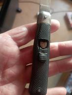 Retro springmes verzamelobject, Enlèvement