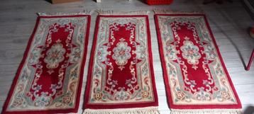 3 identieke kayam tapijten 