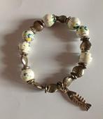 Armband te koop wegens 2 jaar niet meer gedragen, Enlèvement ou Envoi, Autres couleurs, Avec bracelets à breloques ou perles, Comme neuf