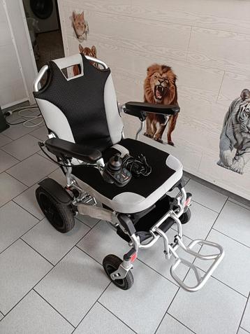 Chaise roulante électrique pliable en aluminium(état neuf) beschikbaar voor biedingen