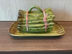 Oude keramiek asperge schaal, Ophalen