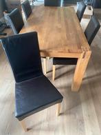 Massief houten eettafel + 6 zwarte kunstleren stoelen., Huis en Inrichting, Ophalen, Zo goed als nieuw, Vijf personen of meer