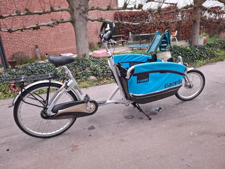 Bakfiets Gazelle Cabby met maxi cosi adapters en regenhoes, Vélos & Vélomoteurs, Vélos | Vélos avec bac, Utilisé, Gazelle, 3 enfants