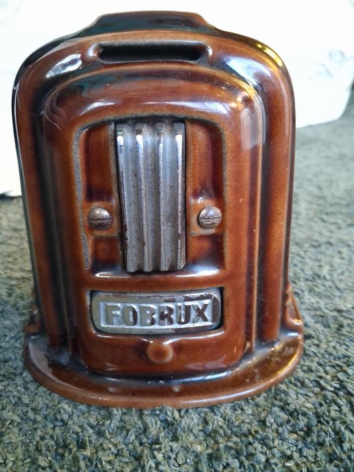 Een spaarpot van geëmailleerd gietijzer in de  van een minia, Antiquités & Art, Antiquités | Jouets, Enlèvement ou Envoi