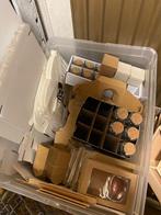 Doos vol verpakkingen (vouwdoosjes etc.), Enlèvement