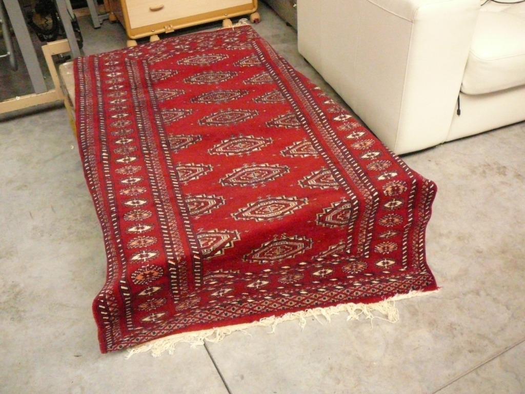 tapis pakistanais noué à la main, Enlèvement, Utilisé