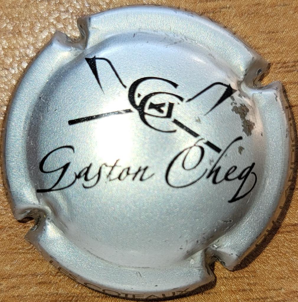 Capsule Champagne Gaston CHEQ argent & noir nr.02a, Collections, Vins, Neuf, Champagne, France, Enlèvement ou Envoi