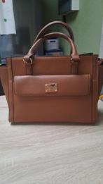 Handtas, Ophalen, Handtas